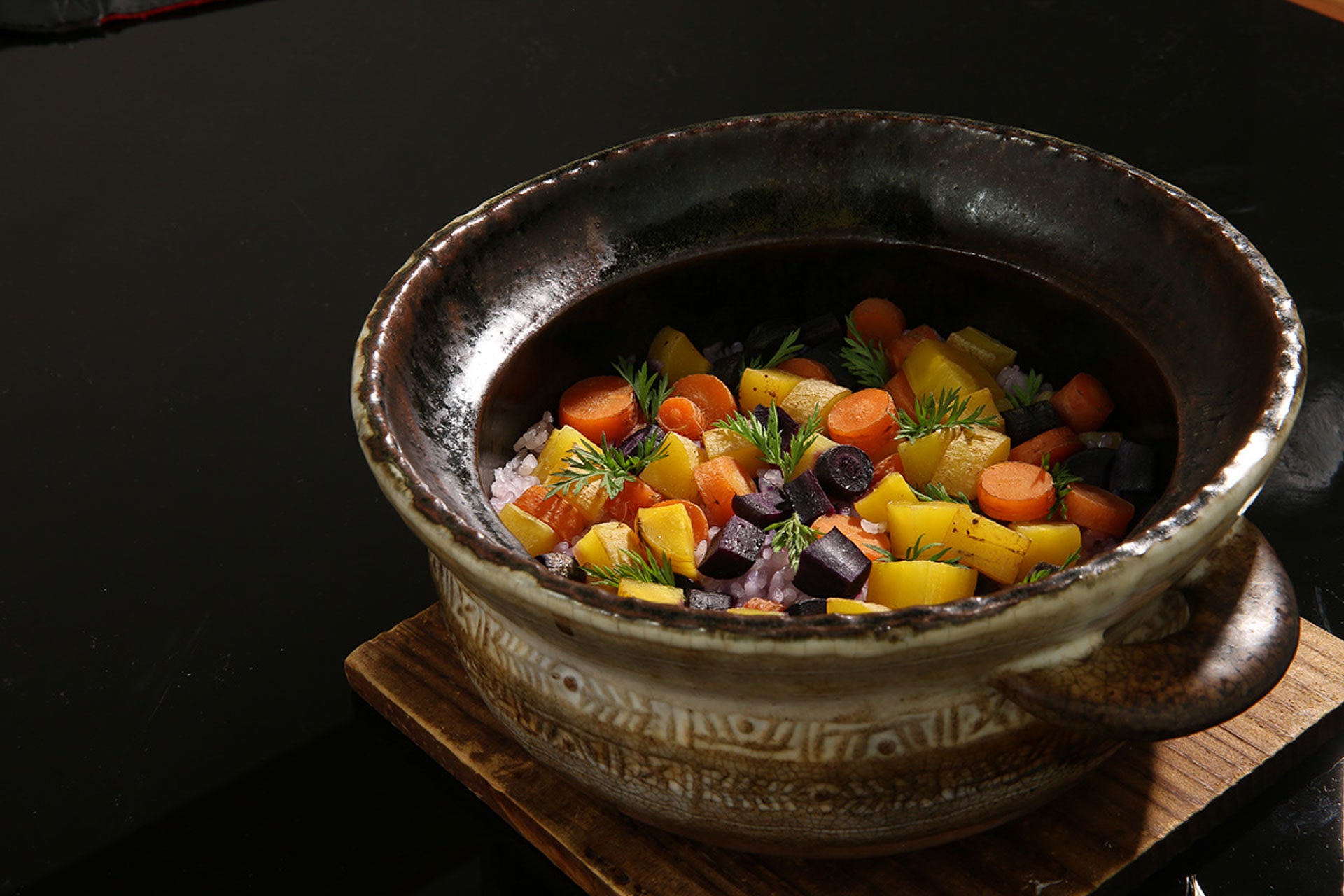 A carrot and rice dish at Den in Tokyo