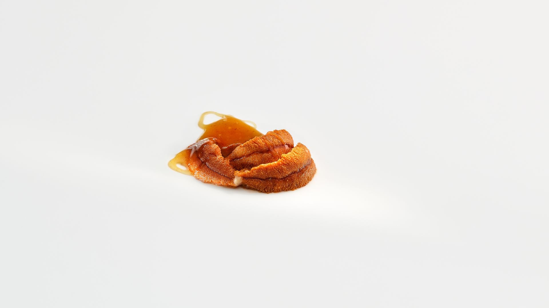 a minimalist dish of sea urchin featured on Mugaritz menu 2022