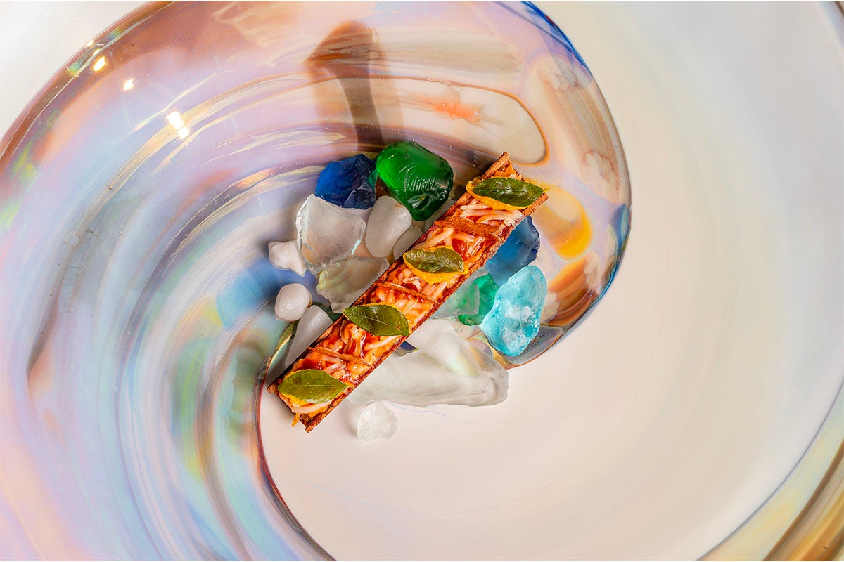 Ghee roast crab, burnt cinnamon, curry leaf crisp at Tresind studio.