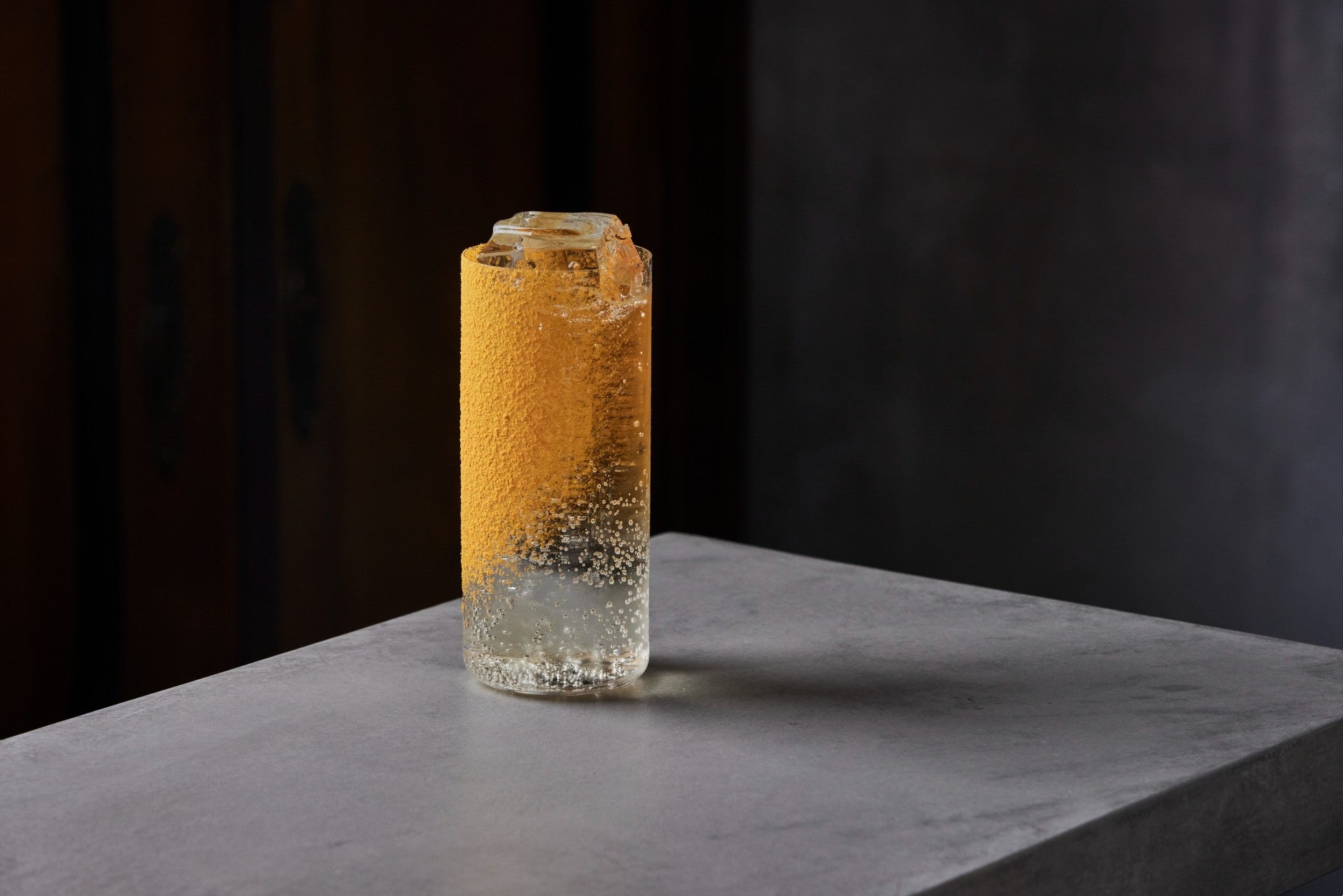 Paloma at Kol in an orange-dusted glass.