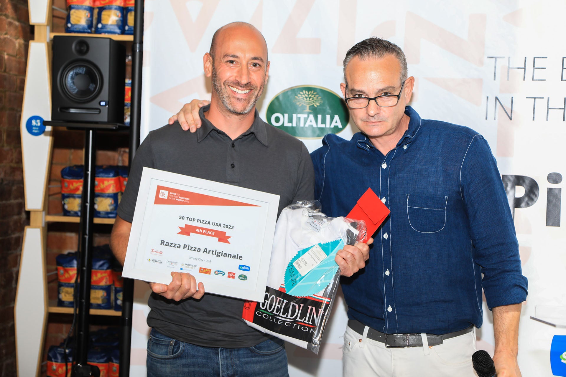 Razza Pizza owner holding the 4th place