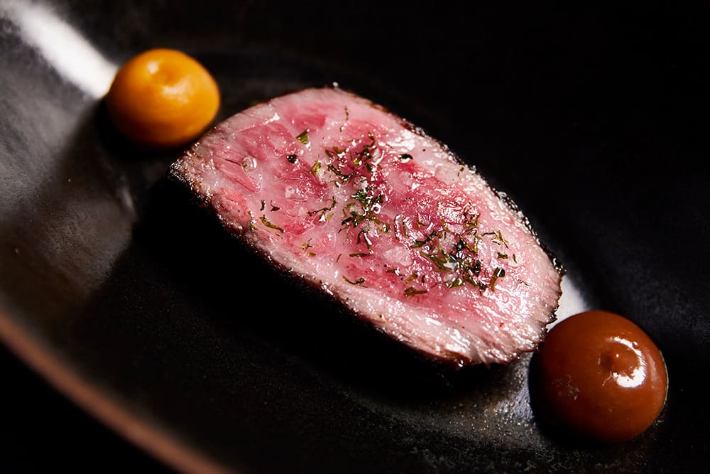 Ekkebus' dry-aged striploin with seaweed, kabocha pumpkin and steak sauce