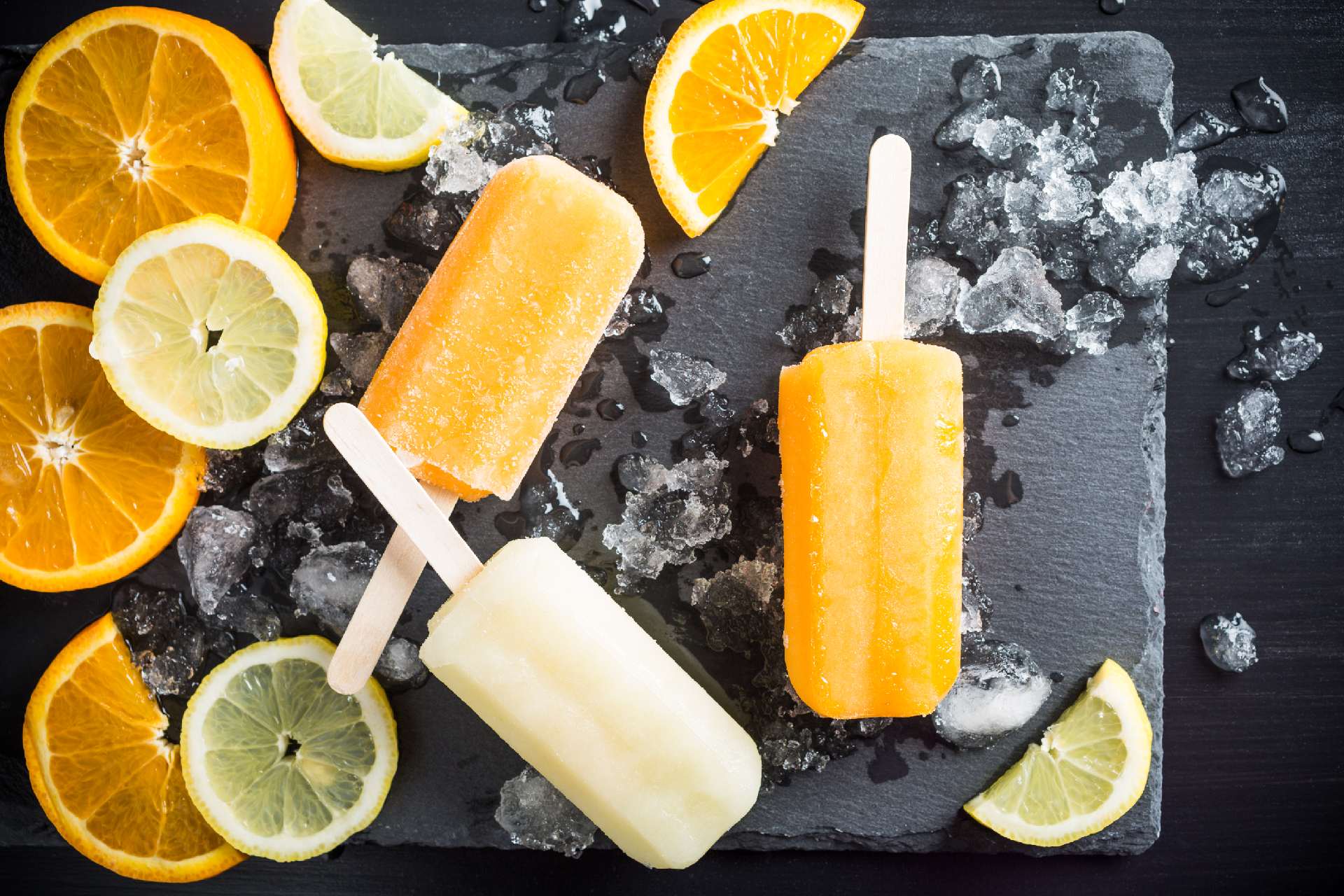 homemade orange and lemon popsicles ©iStock