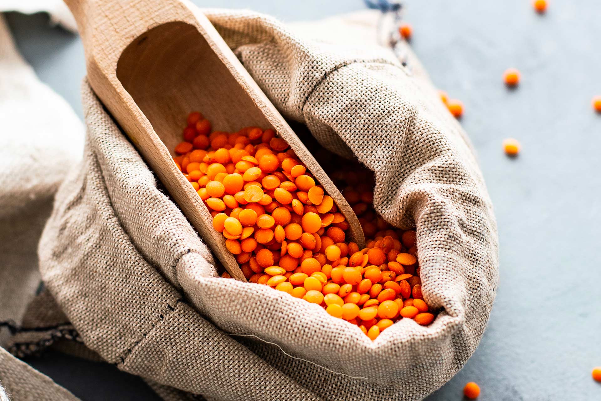 Sack of lentils with a scoop.