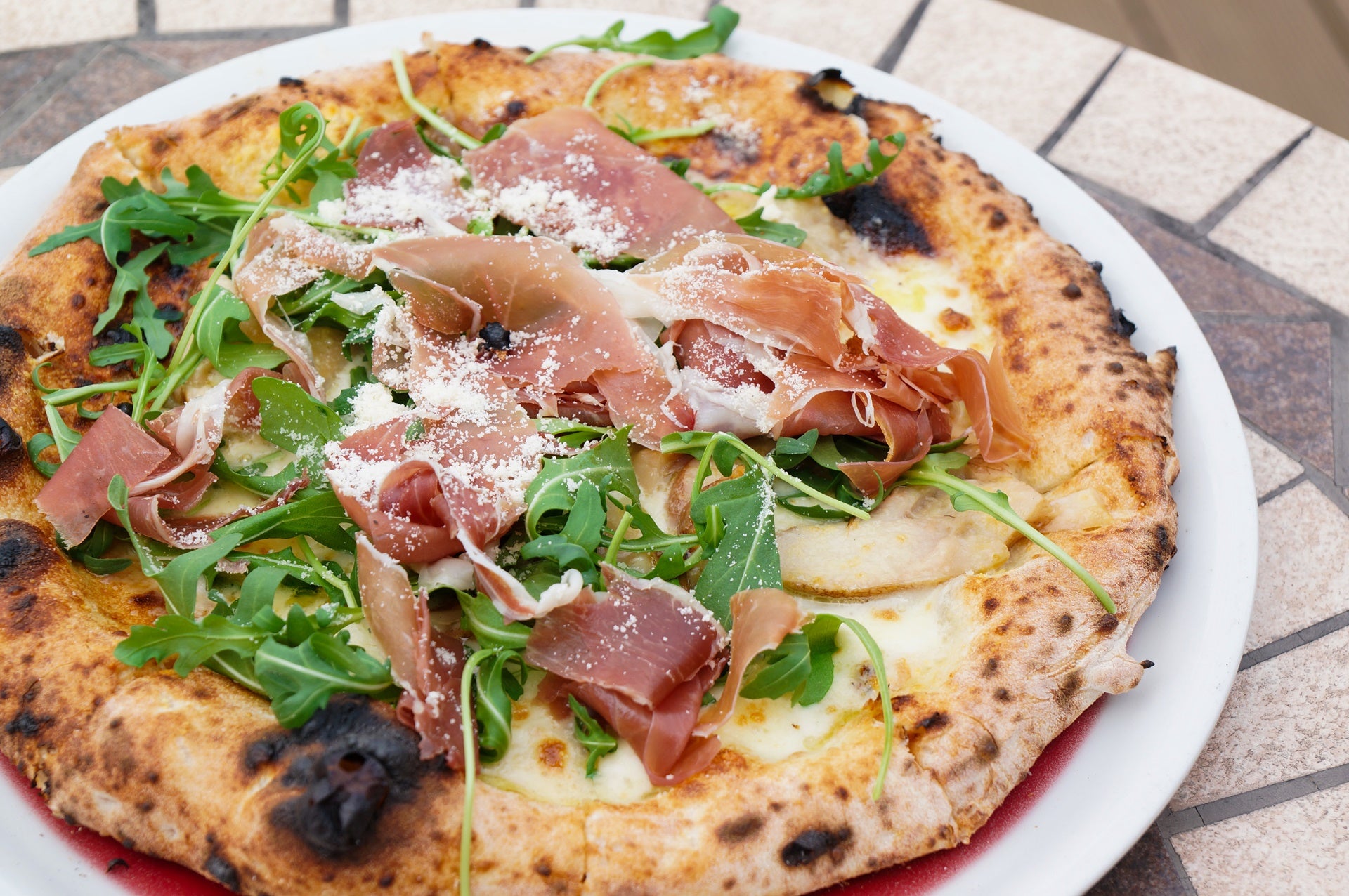A close up of a neapolitan pizza