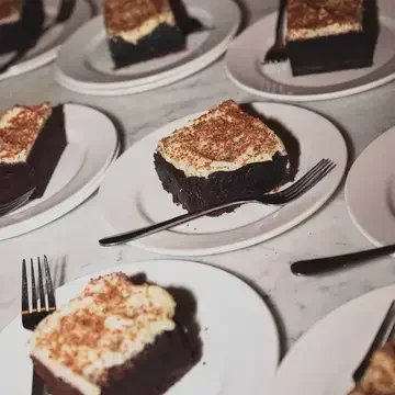 Slices of Alana Laverty's chocolate stout cake on plates.
