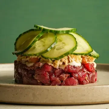 Beef tartare topped with cucumber at Nord in Liverpool.