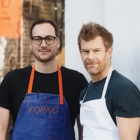Chefs Baldo Pellegrini and Tom Aikens outside Forno.