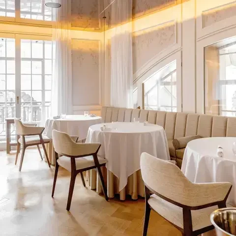 Light-filled dining room at Alex Dilling at Hotel Cafe Royal.