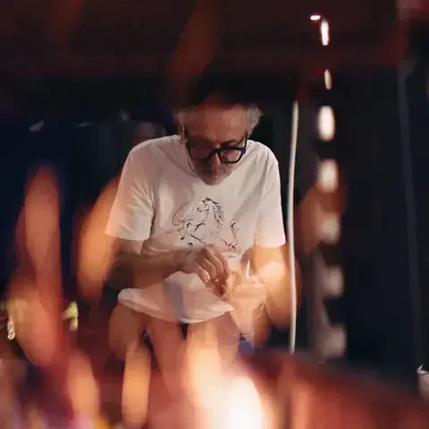 Chef Massimo Bottura in a white t-shirt.