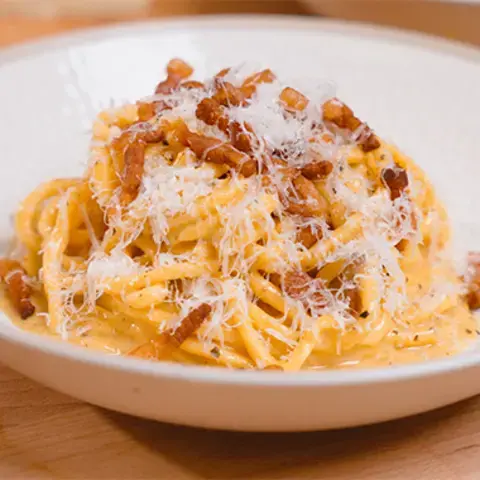 A bowl of spaghetti carbonara.