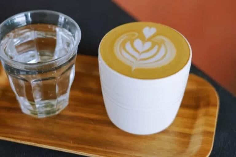 Coffee and a glass of water at Monogram Coffee in Calgary.