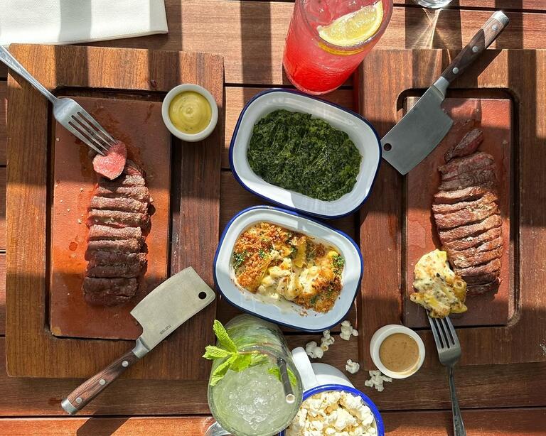 Steak and dishes at Flat Iron in London.