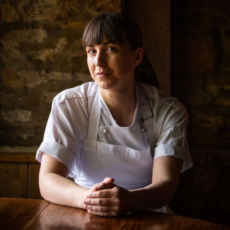 Chef Alice Power sat at a table.