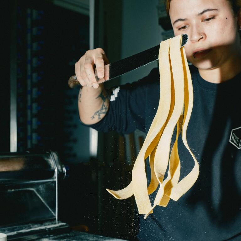 Chef Holly Middleton-Joseph making pasta.