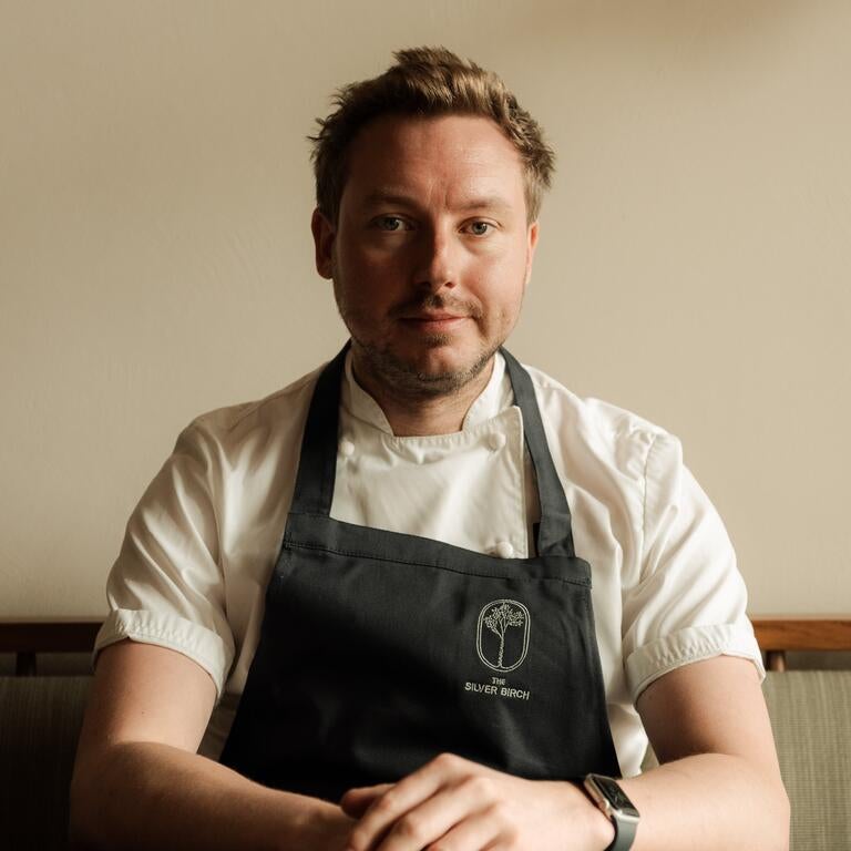 Chef Nathan Cornwell seated at The Silver Birch.