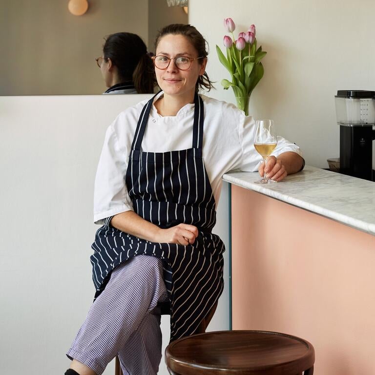 Chef Anna Tobias seated at the bar of Cafe Deco in London.