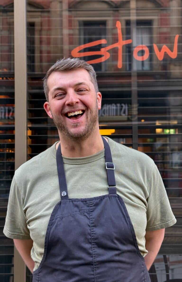Chef Jamie Pickles smiling outside Stow.