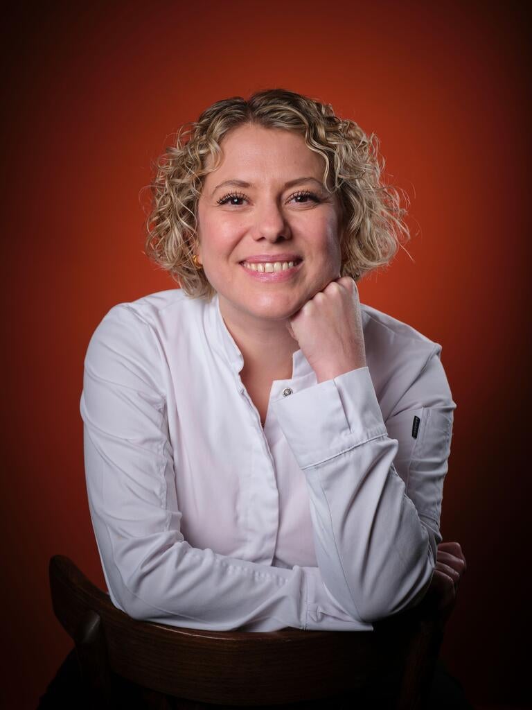 Chef Sally Abé, smiling.