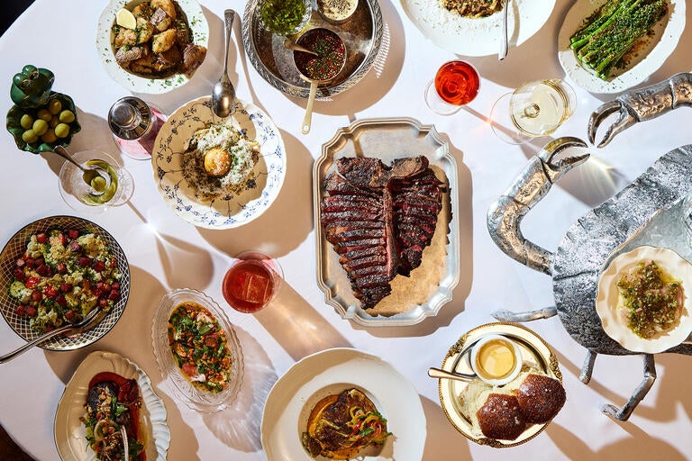 Spread of food at Sunny's Steakhouse.