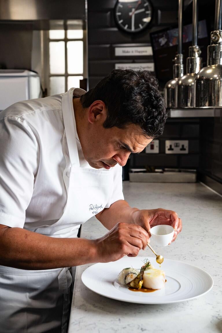 Chef Paul Ainsworth plating a dish.