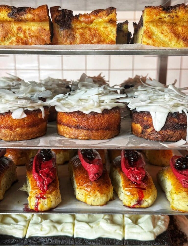 Racks of baked goods at Chatsworth Bakehouse.