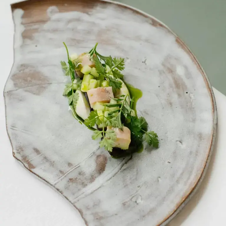 Grilled cucumber, smoked eel, russet apple and garden herbs at Osip in Bruton.