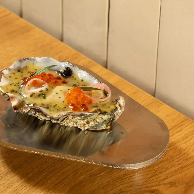 Oyster dish from restaurant Compartir  Credit:  Joan Valera