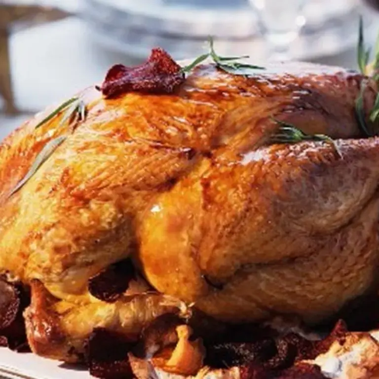 Roast capon with vegetable chips.