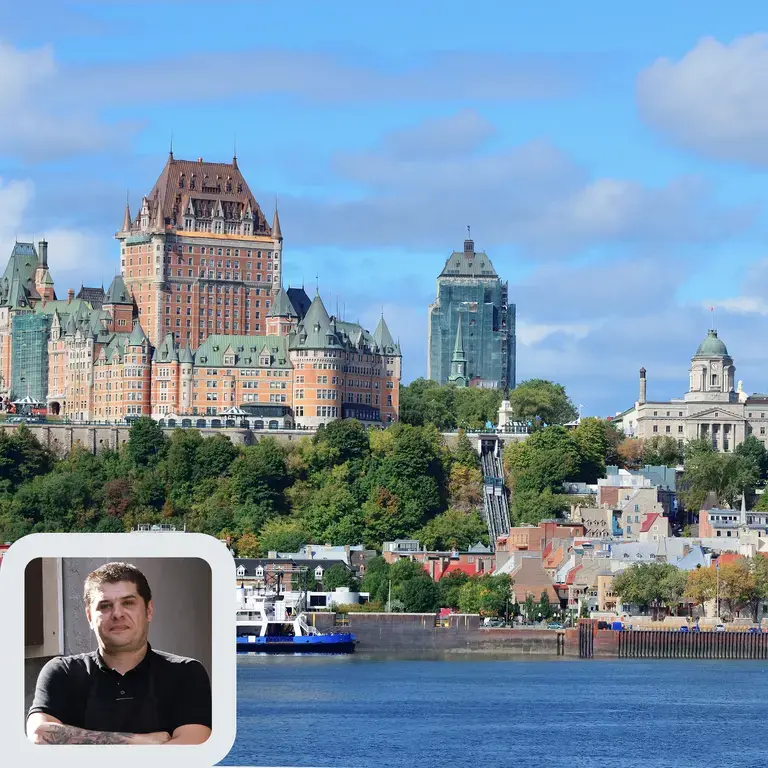 Chef Stéphane Modat and the Quebec City skyline.