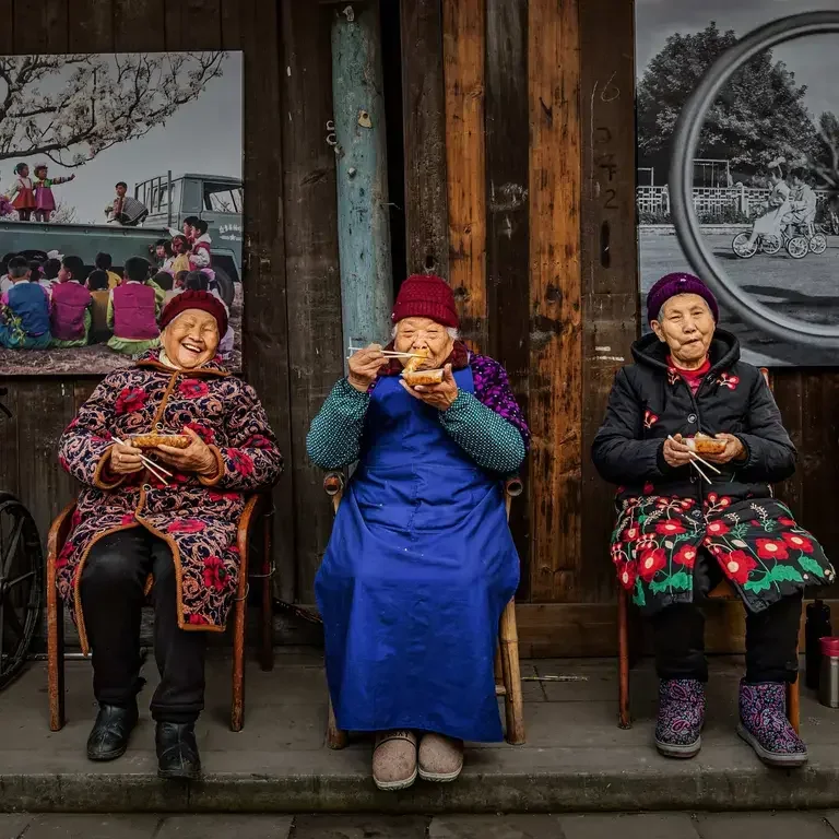 The Elderly Having Delicious Food by Xialong Li.