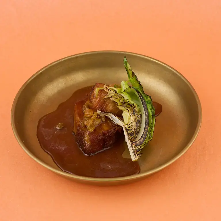 Dark rum and raisin-glazed pork belly at Marvee's Food Shop.