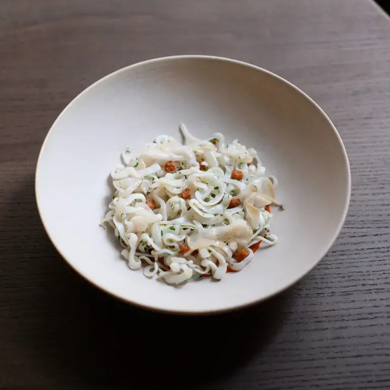 Squid with lardo and vizcaina sauce at Alta.