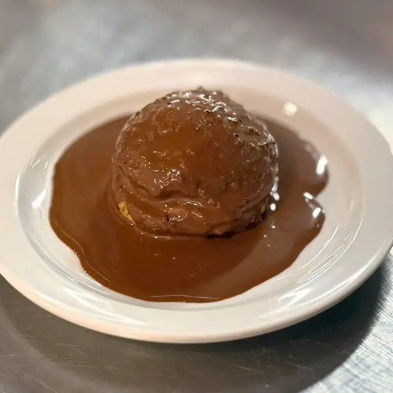 Paris-Brest with custard and chocolate ganache.