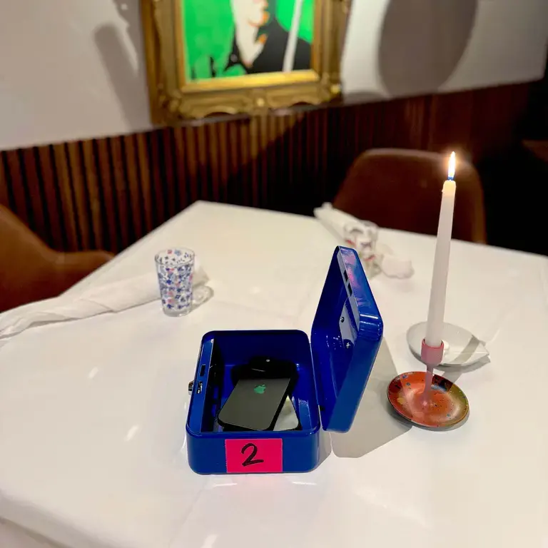 Phones in a box at Punk Royale London.