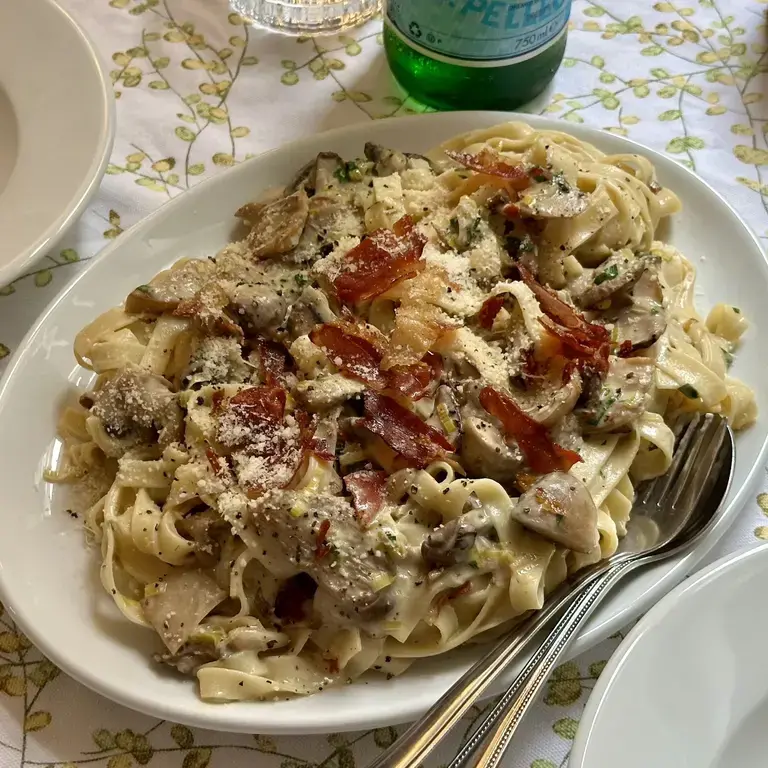 Mushroom, prosciutto and parmesan tagliatelle by Jordon Ezra King.