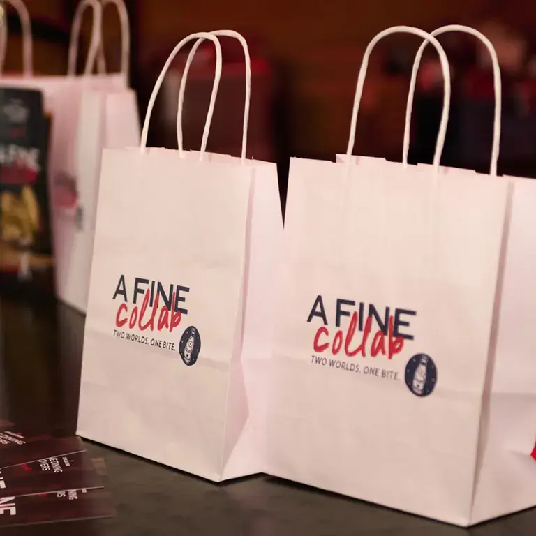 Goodie bags at the A Fine Collab London launch.