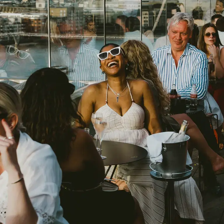 People enjoying drinks at 12th Knot in London.
