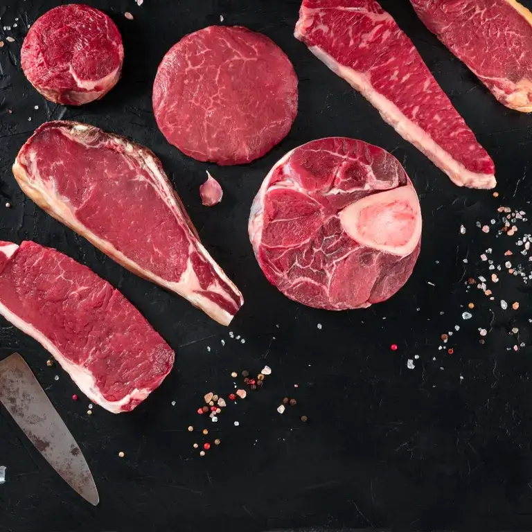 A selection of raw beef cuts.