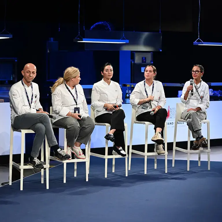 Tom Jenkins moderating the Forum at S.Pellegrino Young Chef Academy Grand Finale.