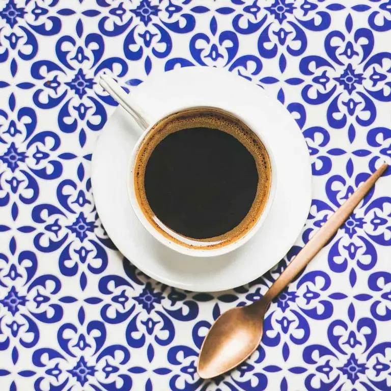 a caffe marocchino against a tiled background