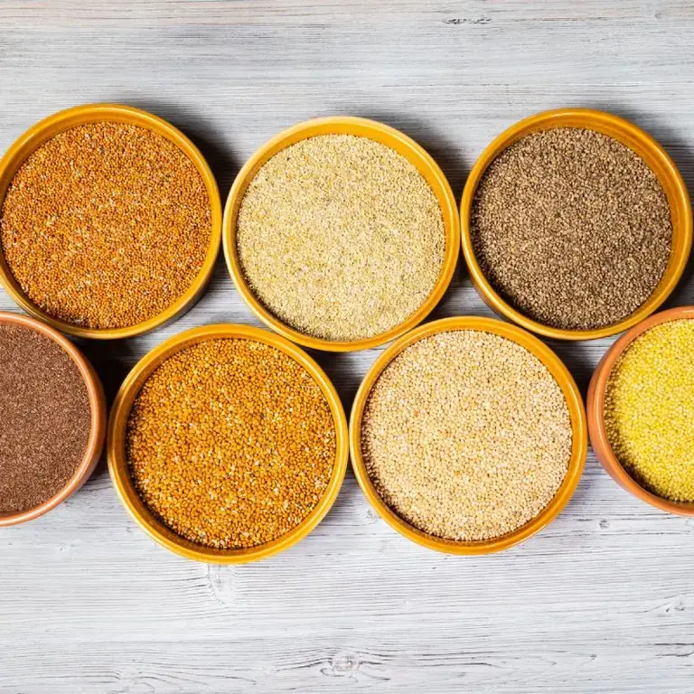 Different types of millet in bowls.