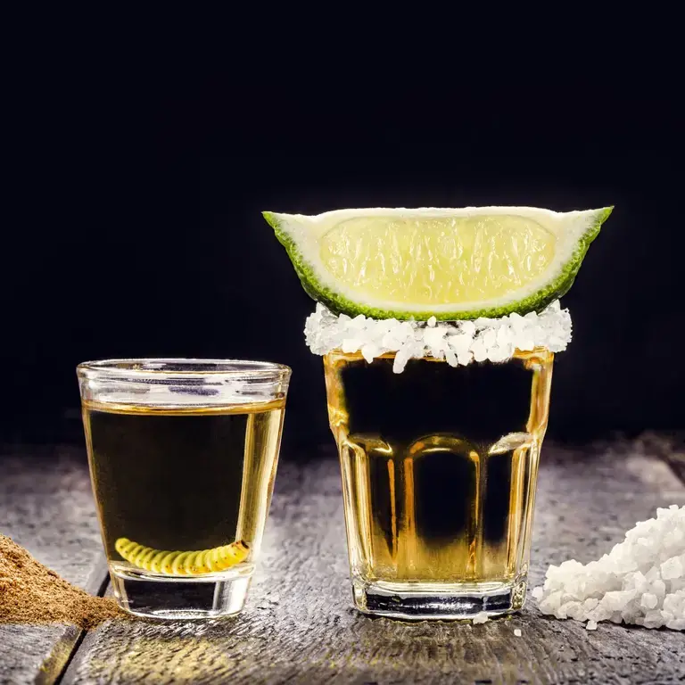 Shots of mezcal and tequila.