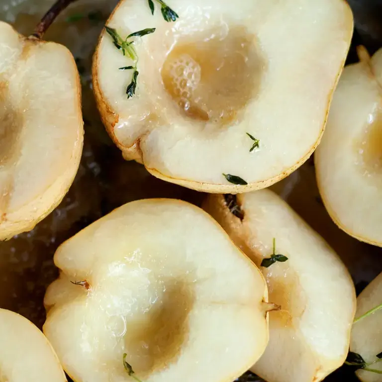 Juicy pears, sliced in half.