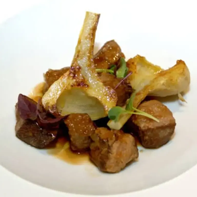Ragu Sauce Made With Lamb Shoulder And Braised Artichokes