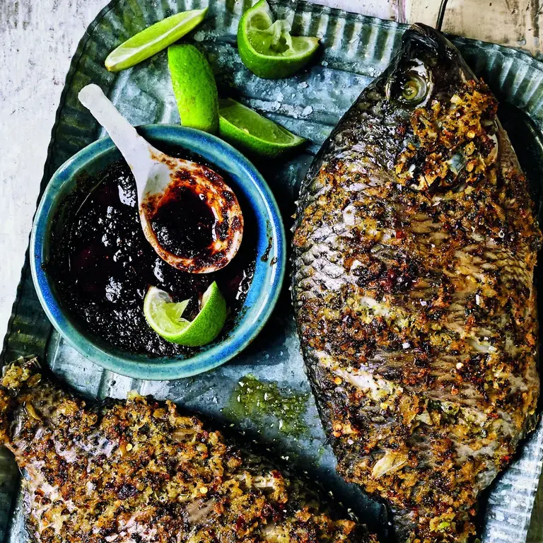 Whole grilled tilapia by Zoe Adjonyoh.