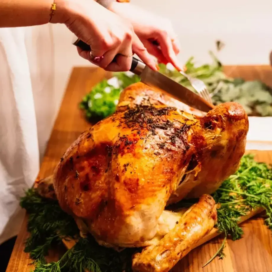 A Christmas turkey being carved.