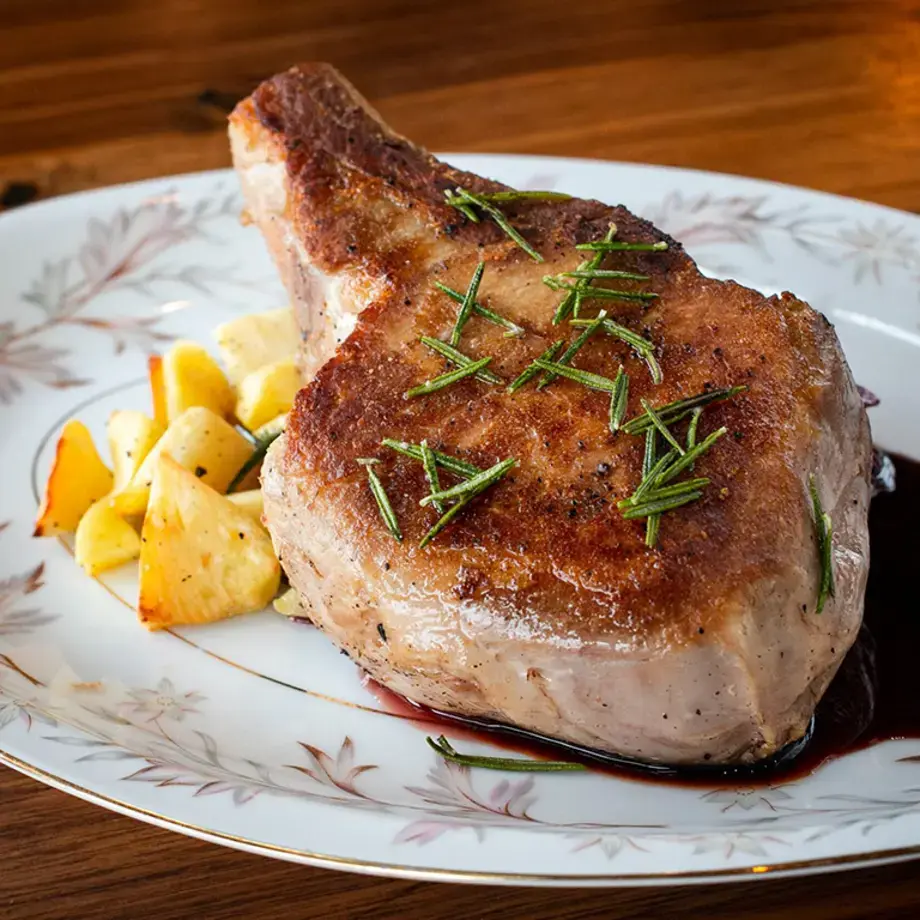 Pork chops with roasted apples.