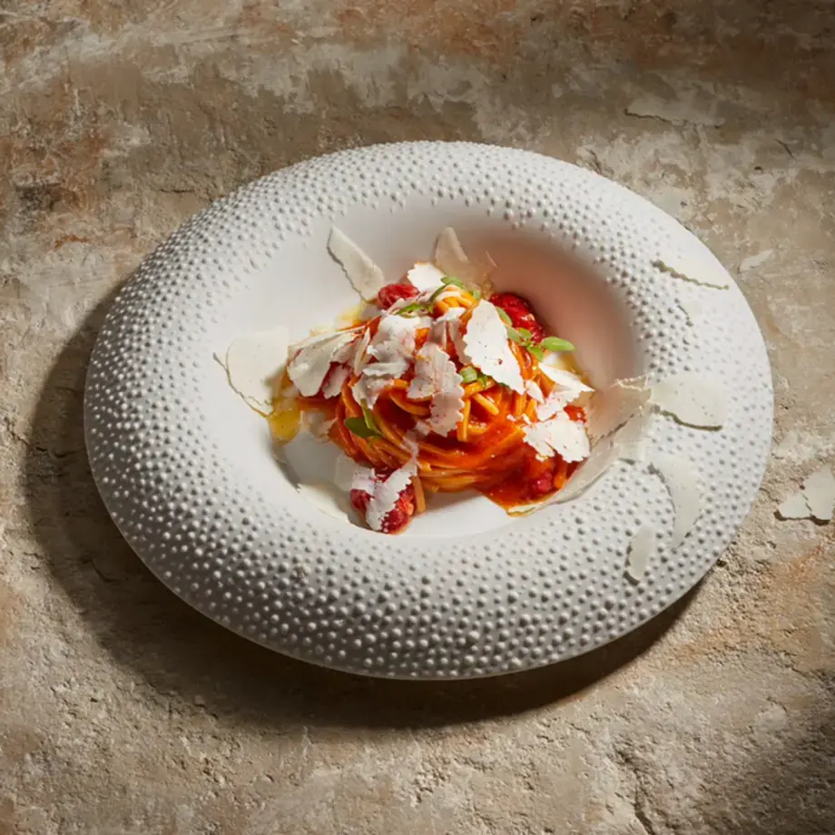 Troccoli with tomato and cacioricotta.