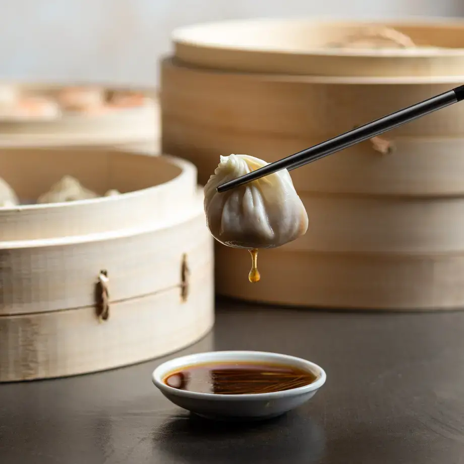 Dumpling and dipping sauce at Din Tai Fung in London.